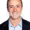 stock-photo-37322550-businessman-smiling-headshot